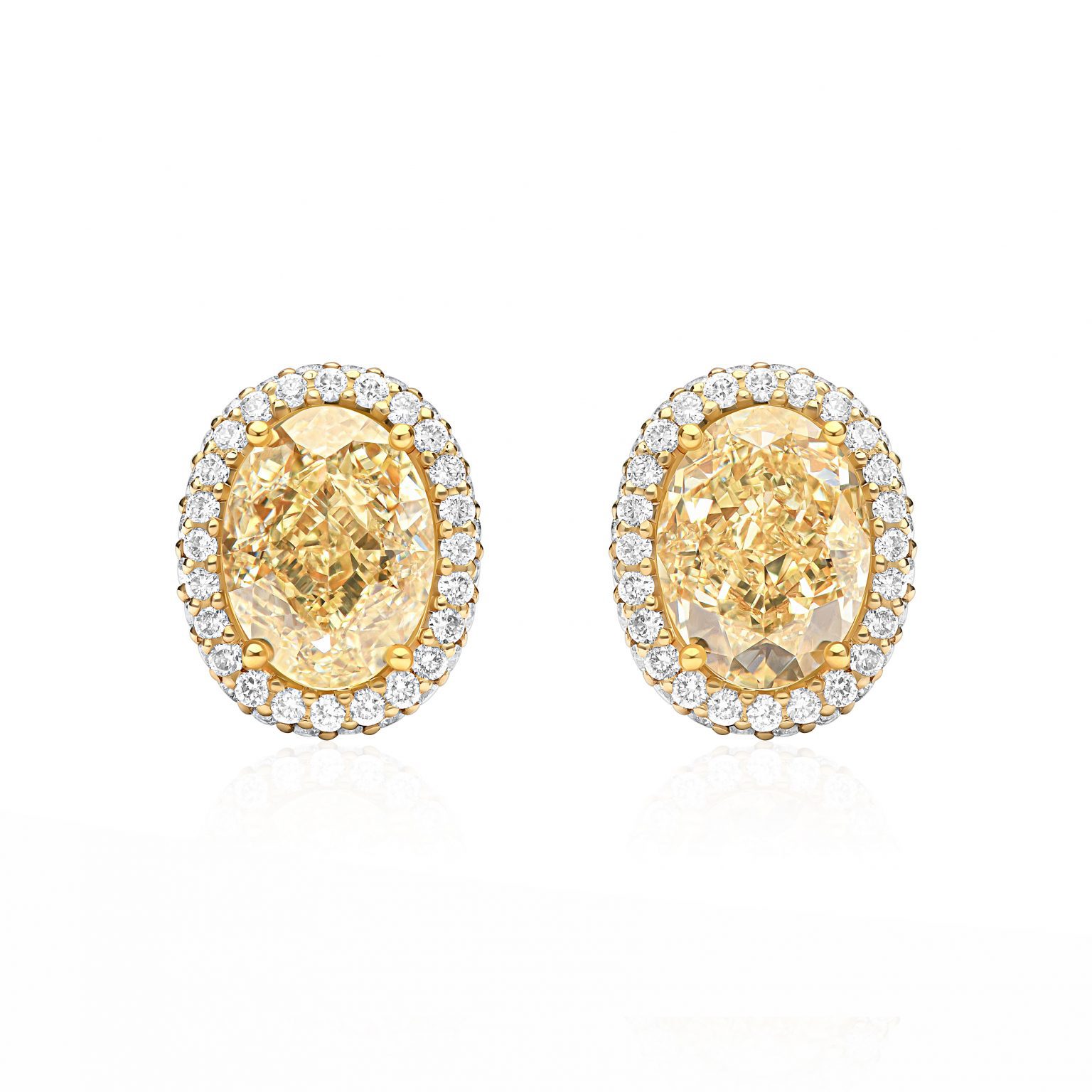 Yellow Diamond stud earrings — 6.03 ct total weight